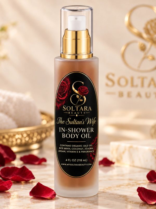 In-shower body oil with rose and gold design.
