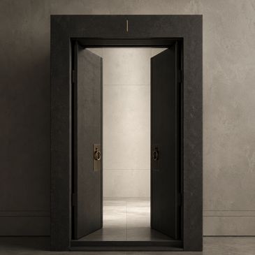 A modern, open elevator door in a minimalist setting.