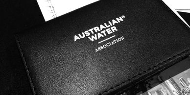 Australian Water Association business card holder black and w hite photo.