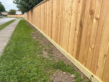 cedar wood fence with baseboard  cap and facia