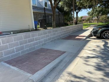 Salco Fence Company retaining wall and sidewalk ADA compliant
