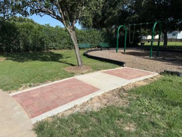 ADA compliant sidewalk. Salco Fence Company