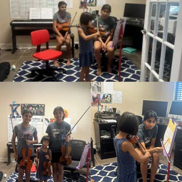 Young violin students practicing together in a cozy room.