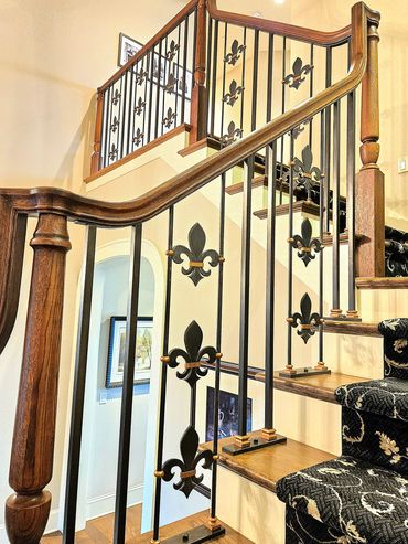 Hand forged wrought iron fleur-de-lis decorative guard railing by Primal Forge blacksmith shop