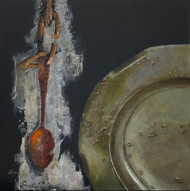 Rustic spoon and plate with textured background.