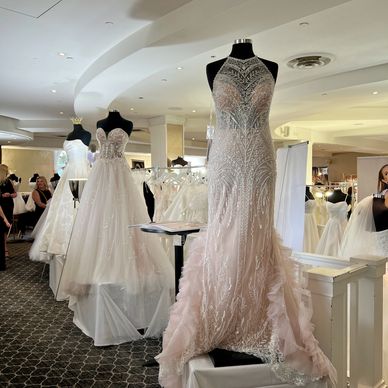 Bridal gowns on display at the trade show
