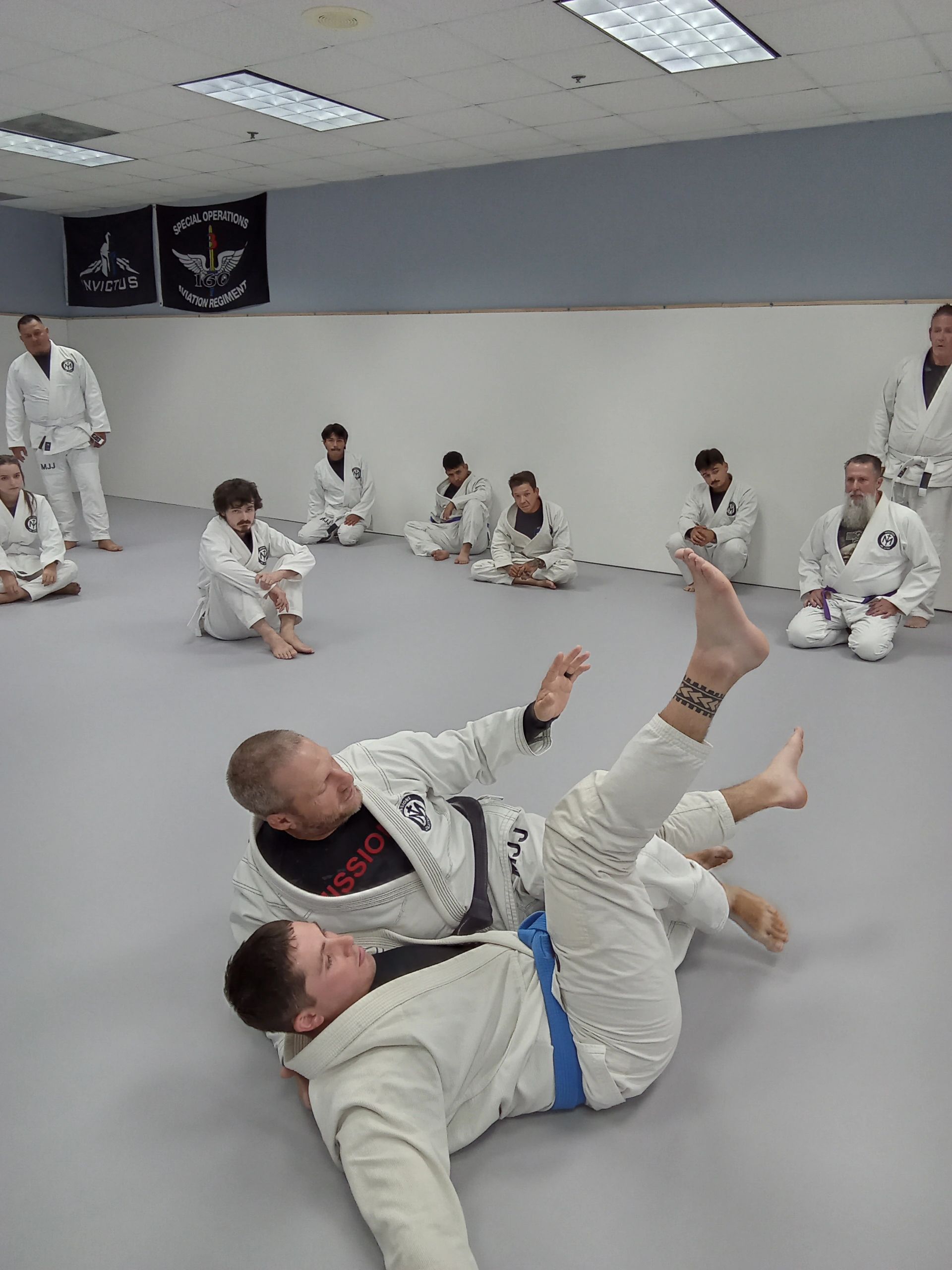 Coach teaching a class