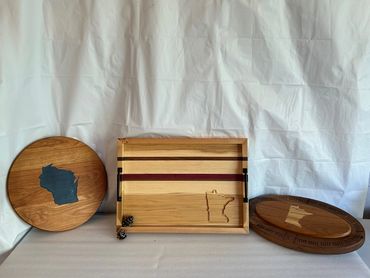Different shapes of trays made of wood