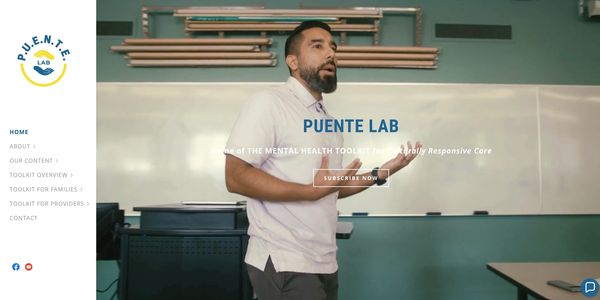 Man giving a presentation in a classroom for Puente Lab.