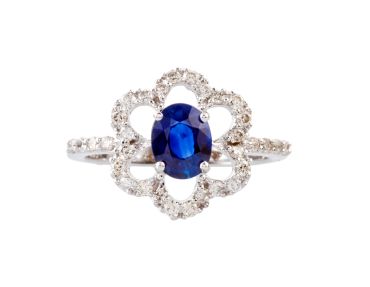 Elegant ring with a blue sapphire and diamonds.