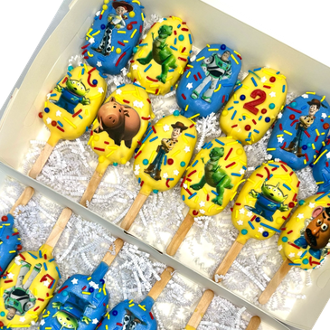 Toy Story-themed cake pops with characters and number 2 decorations.
