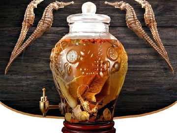 Dried seahorses surrounding a urn containing dried seahorses and other ingredients