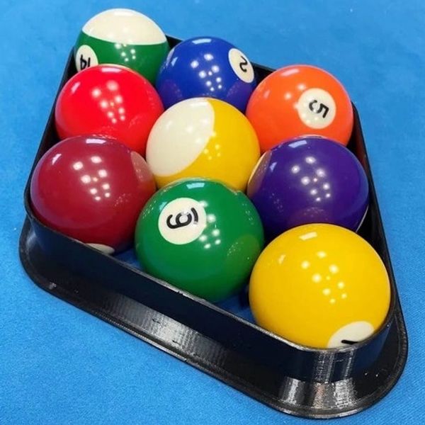 A triangle rack of colorful billiard balls on a blue pool table.