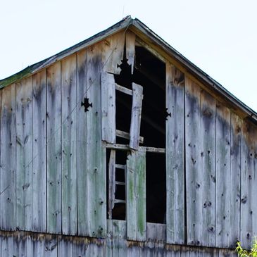old family barn with missing boards