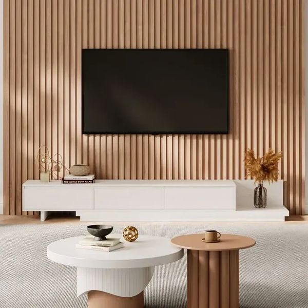 Modern living room with textured wood wall and minimalist furniture.