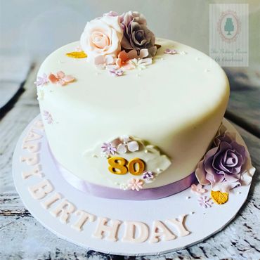 Pretty fondant cake for 80th birthday