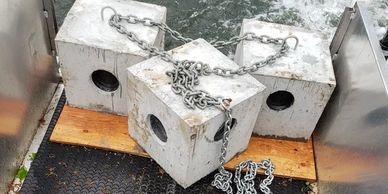 Anchor chain and anchor block inspection and repair.