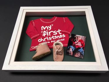 Memories such as babies first Christmas  can be preseved in a box frame like this. Box frames