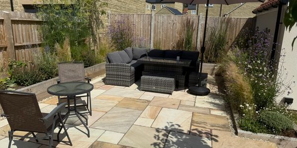 Full garden design with patio, raised beds and steps installed by TEC Landscaping in Malmesbury, Wil