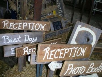 Variety of wooden picket signs for outdoor events