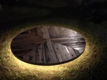 Wooden round stage lighted from bottom