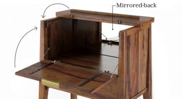 Wooden cabinet with fold-out mirrored back and doors.