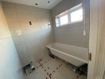 bathroom being fitted by our skilled plumbers and tilers. 