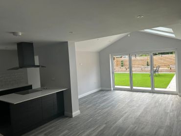 newly fitted howdens kitchen island and decorated single storey extension to the back. 