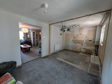 existing kitchen removed, partition wall removed ready for plastering and new kitchen. 