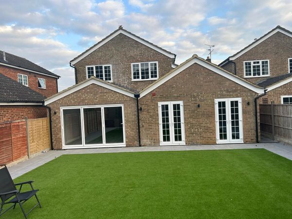 landscaped garden and double storey extension. 