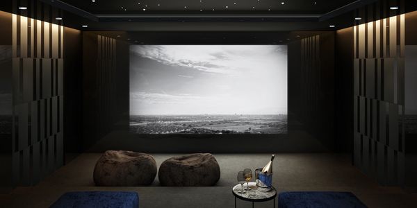 a home theatre with blue accent accessories.