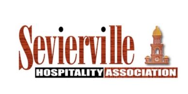 Logo of Sevierville Hospitality Association with stylized text and a small building icon.