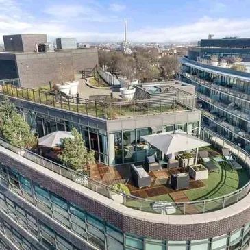 condo terrace with a view on 3 sides with multiple zones for entertaining.