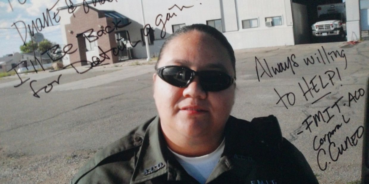 Portrait of a person in uniform with handwritten notes.