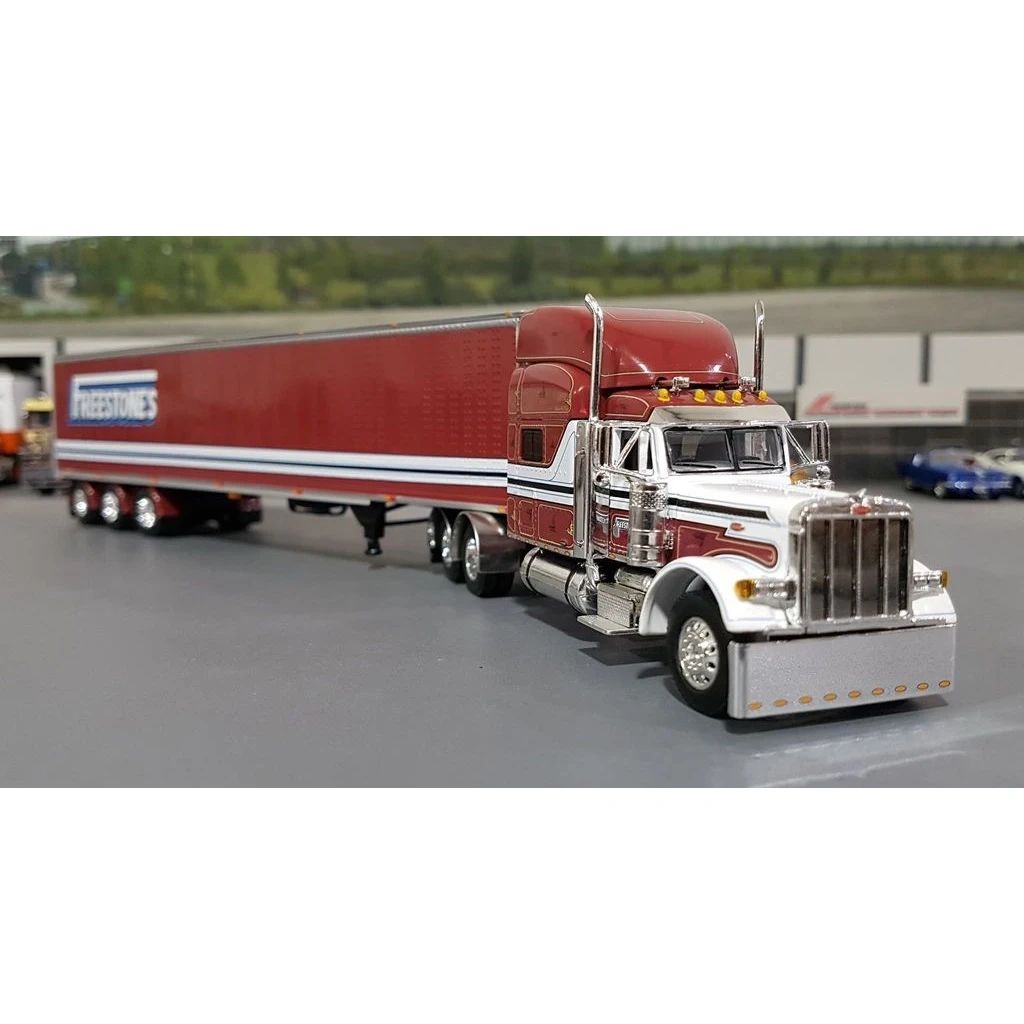 1/64 DCP Peterbilt 379 Freestones with TriAxle Trailer