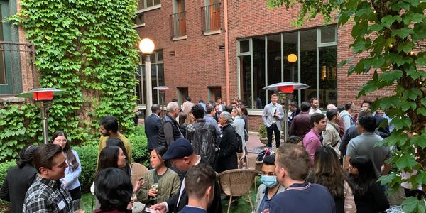 Courtyard full of people at the gener8tor Sustainability Portfolio Day with Chicago Climate Connect