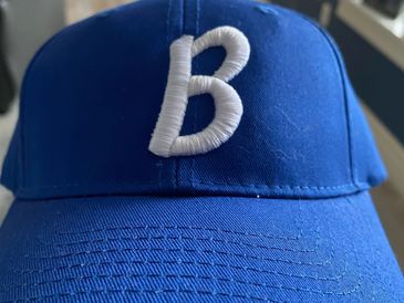 Embroidered  and sublimated patch ball caps are available in fitted and snapback styles. 