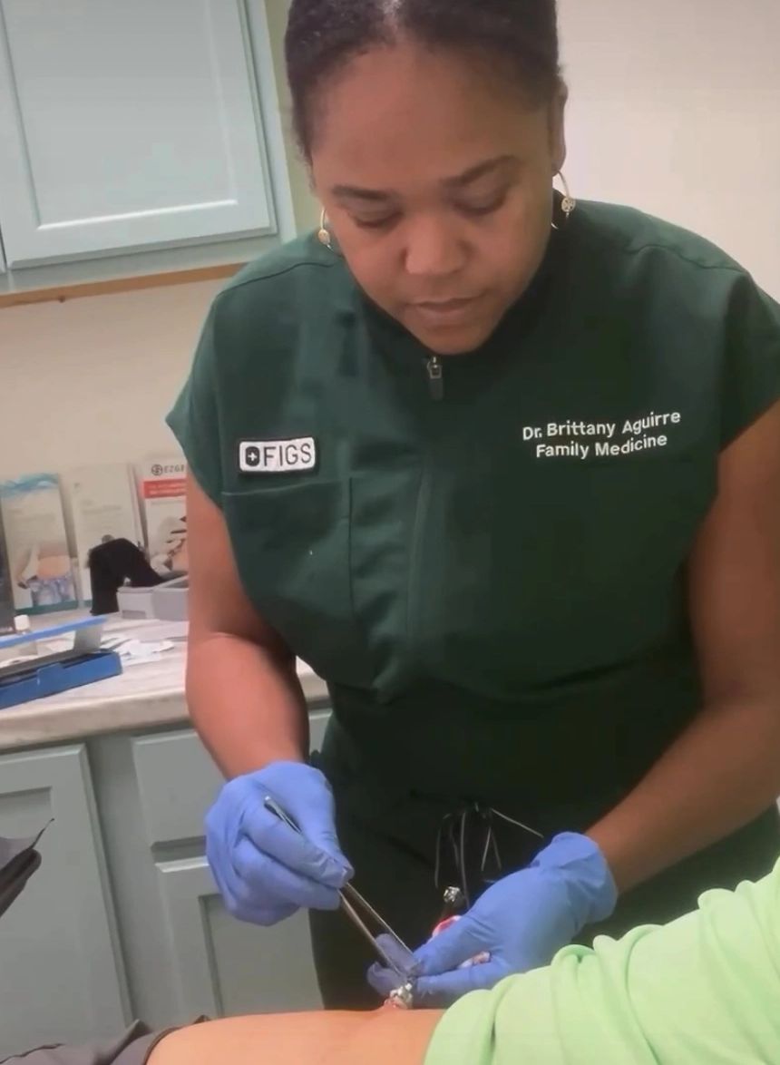 Dr. Aguirre performing a male pellet insertion. 