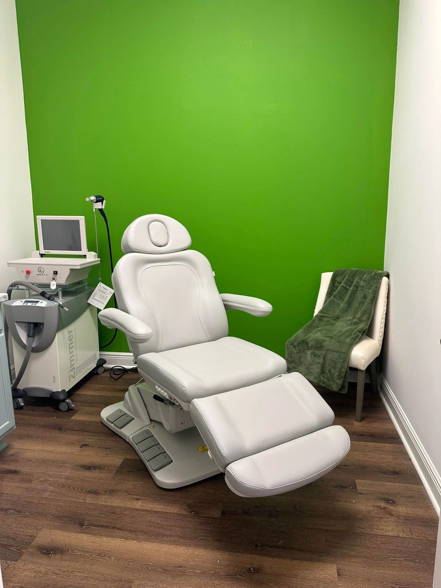 Clean, professional medical spa treatment room with neutral tones at Genesis Health And Beauty Bar Llc in Daphne
