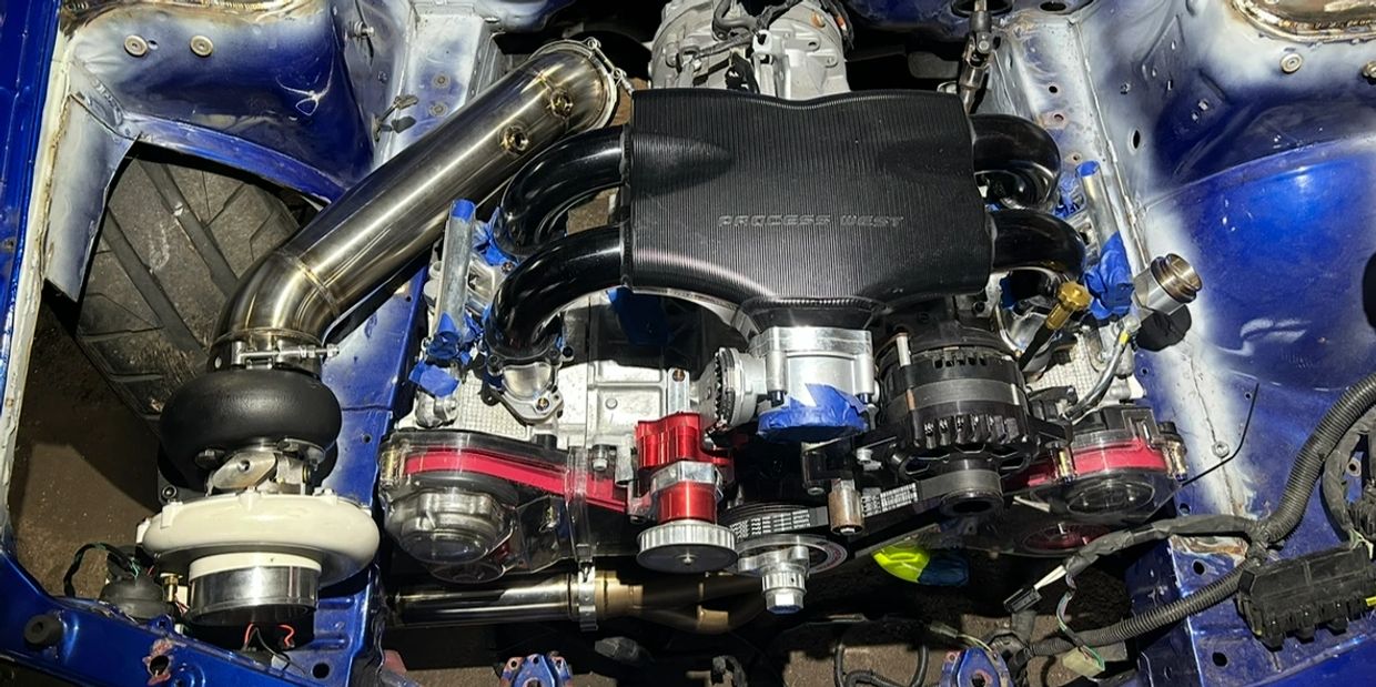 Custom turbo kit we built for a 1000 hp subaru WRX drag car 