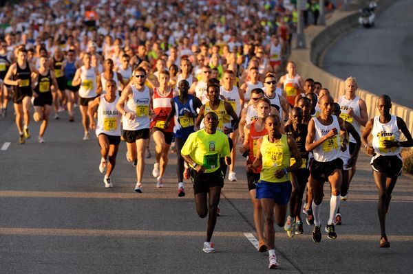 Group of people running in the city