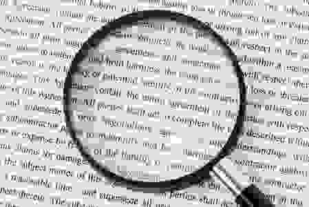 Magnifying glass over a text