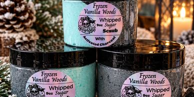 Jars of Frozen Vanilla Woods whipped sugar scrub with activated charcoal.