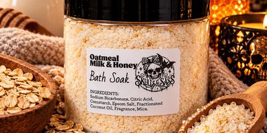 Oatmeal Milk &amp; Honey bath soak container with oats.
