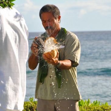 Kelvin Ho Kauai wedding minister kahu Alohana Weddings Coconut breaking water sharing ritual 