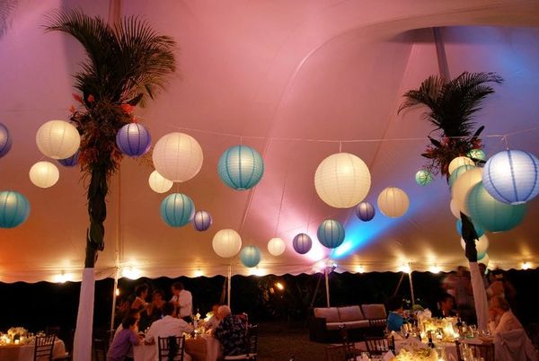 tropical tented wedding Hawaii wedding reception ideas tent pole decor wedding lanterns 