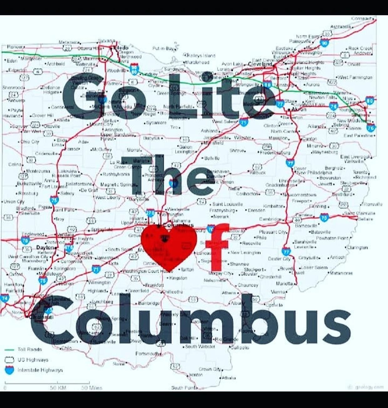 A sign reading 'Go Lite The Heart of Columbus' with a map background.