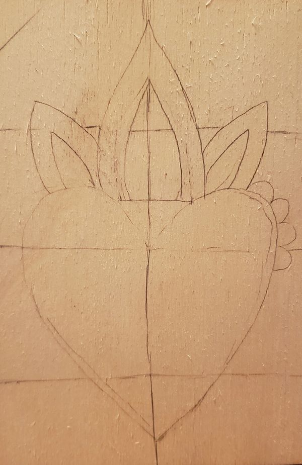 Pencil sketch of a heart with three pointed petals on top.