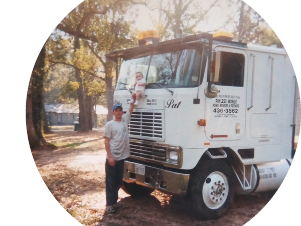 Taylor and her dad Pat with his first mobile home toter in August 1999.