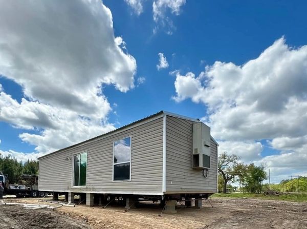 Recent office unit relocation and set up by Simmons Mobile Home Movers.